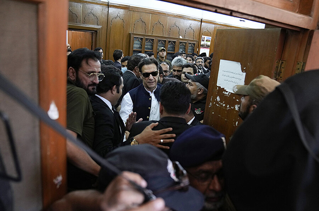 Imran Khan leaves after appearing in a court, in Lahore, Pakistan, on June 7, 2023. Source: K.M. Chaudary/AP