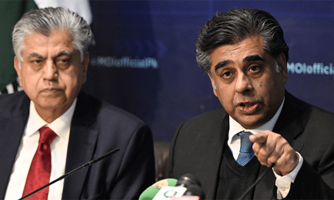 Caretaker Interior Minister Gohar Ejaz (R) and caretaker Information Minister Murtaza Solangi address a press conference on election safety in Islamabad on February 6, 2024. Source: AFP