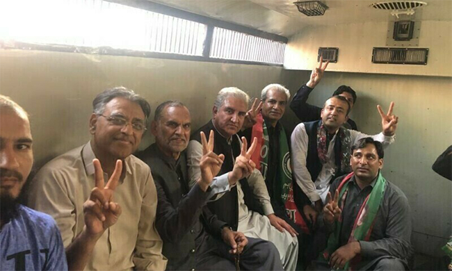 PTI leaders inside a police van in Lahore on Wednesday. Souce: Shah Mahmood Qureshi/ Twitter