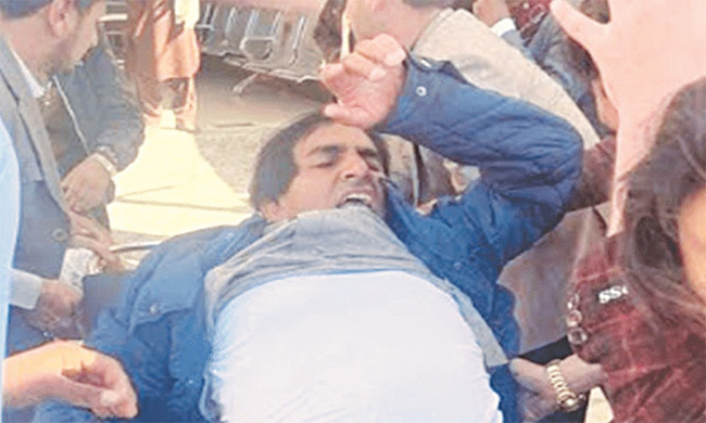 Mohsin Dawar being shifted to hospital after he was injured in police firing on a protest outside the RO’s office in Miramshah Cantt. Source: Dawn