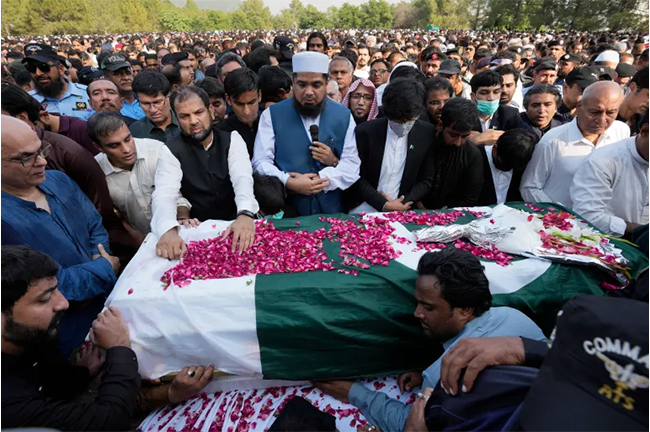 People attend the funeral prayer of slain senior Pakistani journalist Arshad Sharif, in Islamabad, Pakistan. Source: Anjum Naveed/AP Photo