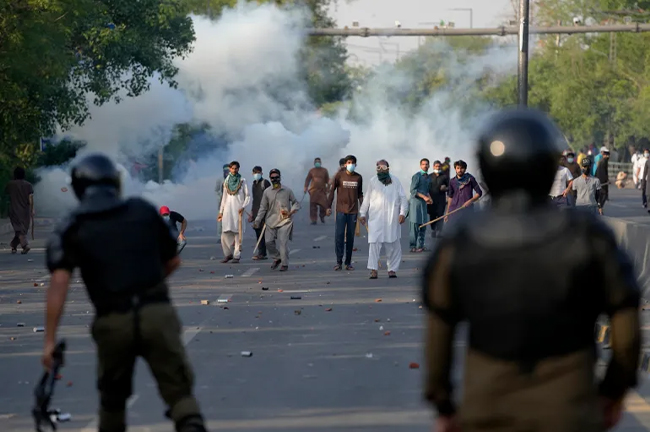 Khan’s supporters protesting against his arrest in Lahore on May 9, 2023. Source: K M Chaudary/AP Photo