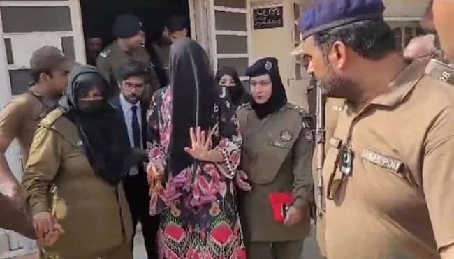 Khadija Shah being taken by police from the courtroom on 24 May 2023 in this still taken from a video. — Source: Geo.tv 