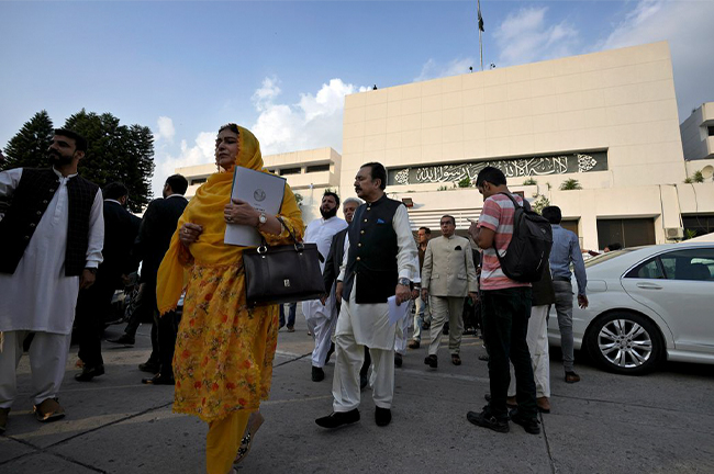 Lawmakers of the National Assembly arriving for a group photo with Pakistan’s Prime Minister Shehbaz Sharif in Islamabad on Wednesday. Source: Anjum Naveed/Associated Press